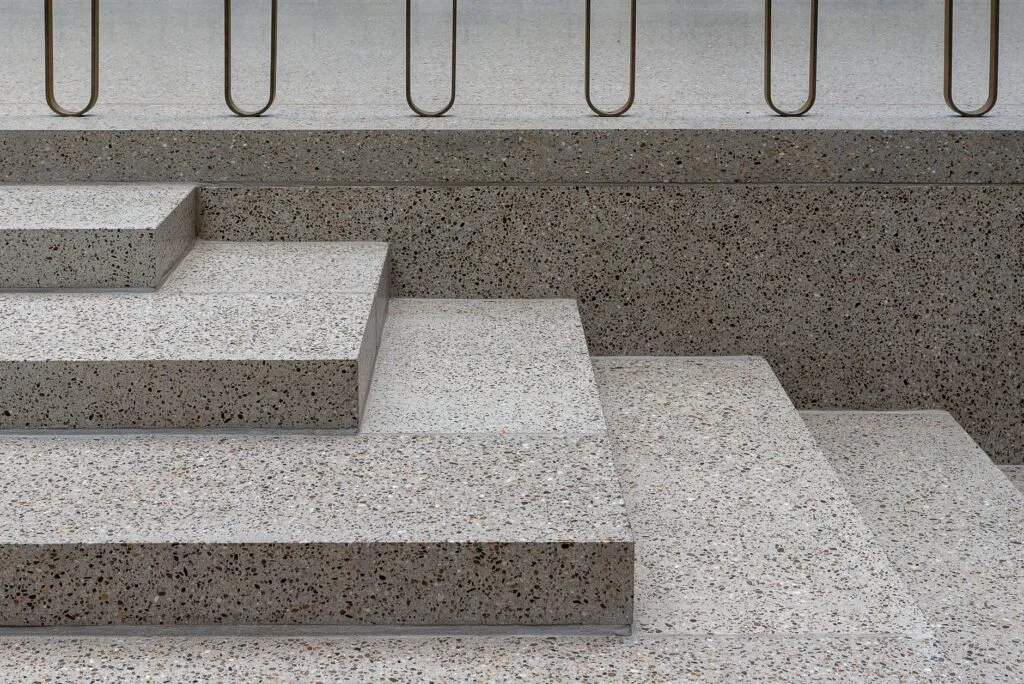 Concrete steps with metal railings, the kind of step construction Sedona Concrete builds in Columbus, OH