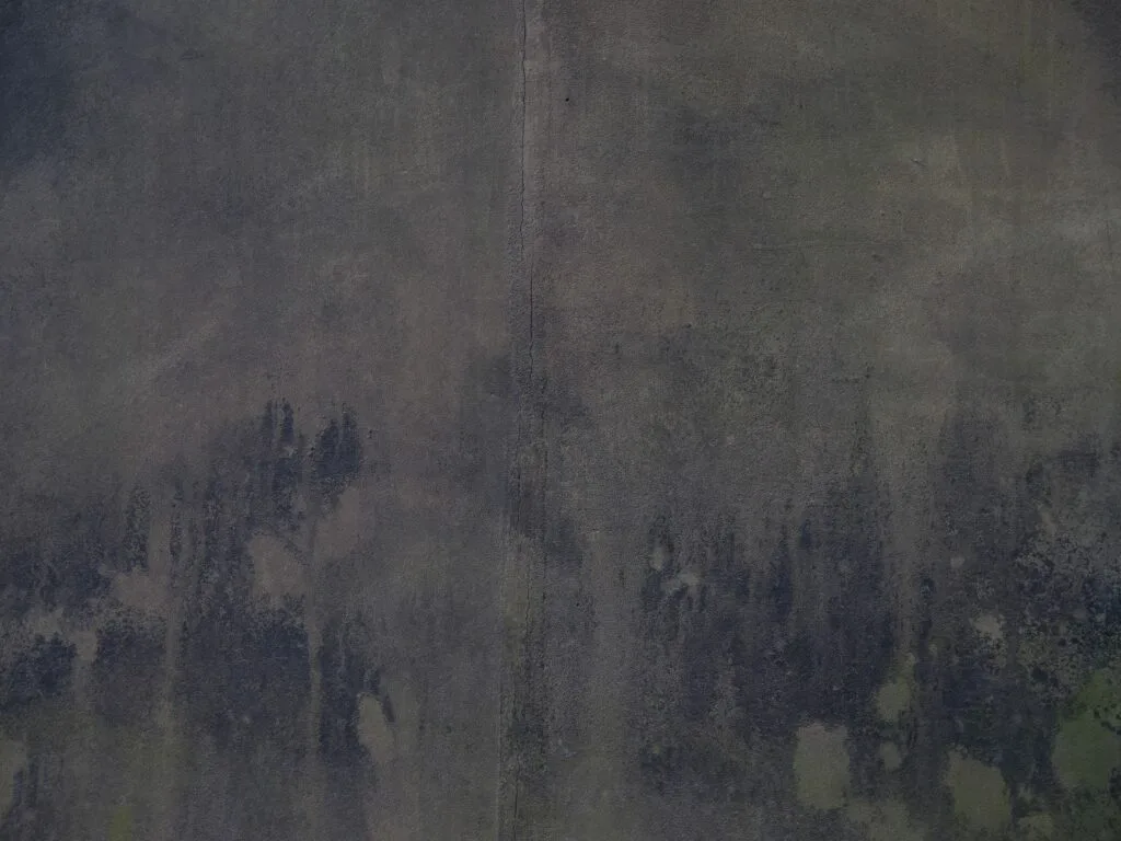 Weathered concrete surface showing the wear that concrete repair in Columbus, Ohio addresses